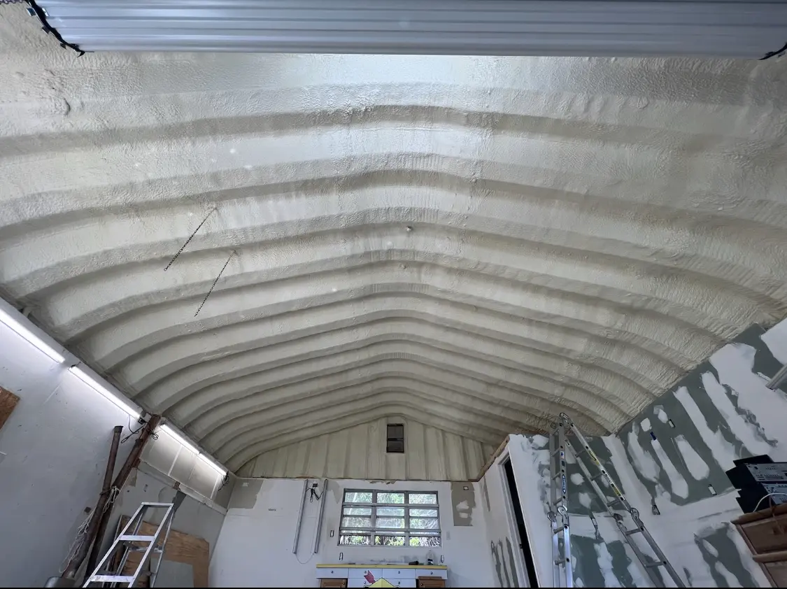 Spray polyurethane foam applied to the underside of a metal roof deck in Benton Harbor